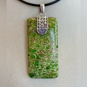 Gaspeite and Silver Pendant. 1”W x 1.25” Long. NEW